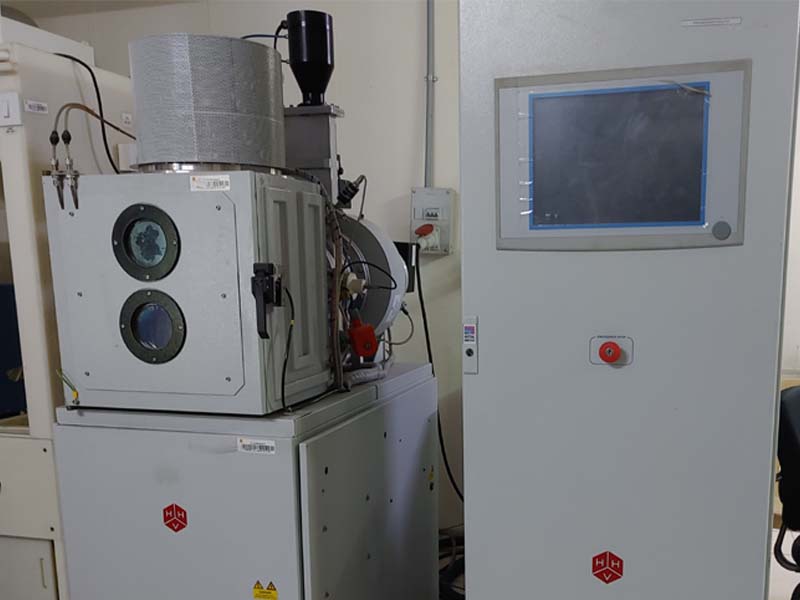 High vaccum thin film deposition
